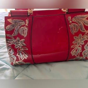 Red purse with sequin
